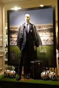 the Trussardi store displaying the official formal suit for Juventus